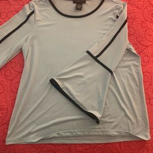 Women’s blouse powder blue with black trim